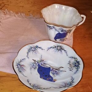Elegant Blue and Gold Floral Teacup and Saucer Set